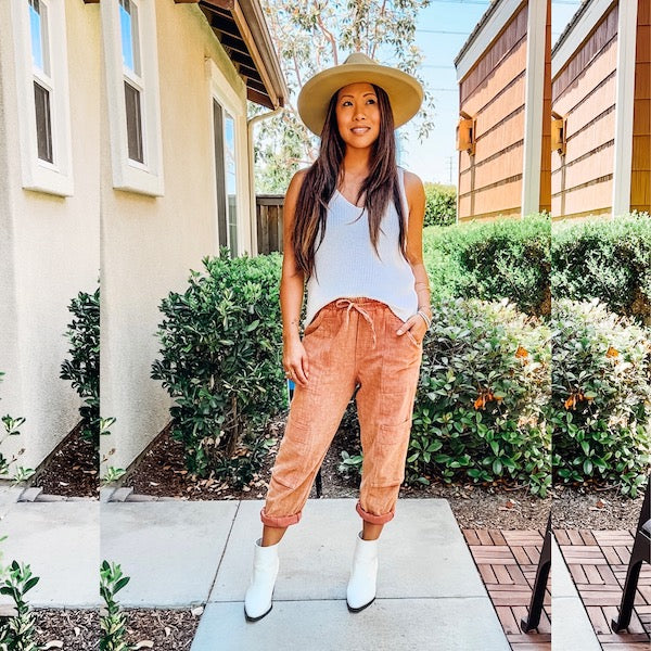 SHOP: Terracotta pants, white crochet tank, wide brim hat, white booties